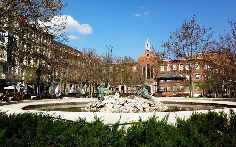 Plaza de Chamberi in Madrid, a residential square ringed by apartment blocks and trees