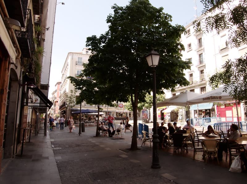Shaded terrace tables on Plaza de Chueca