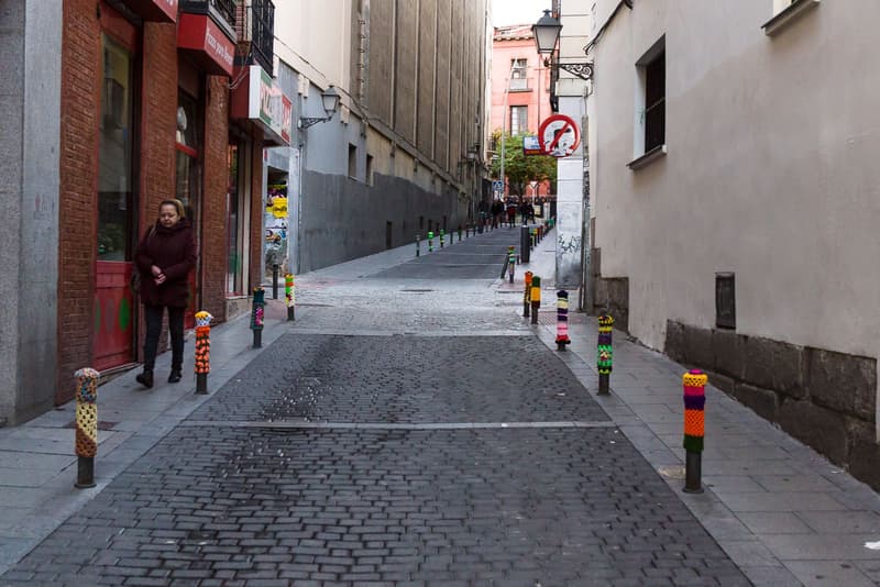 Calle de Lavapies in Madrid, a steep residential street lined with balconies
